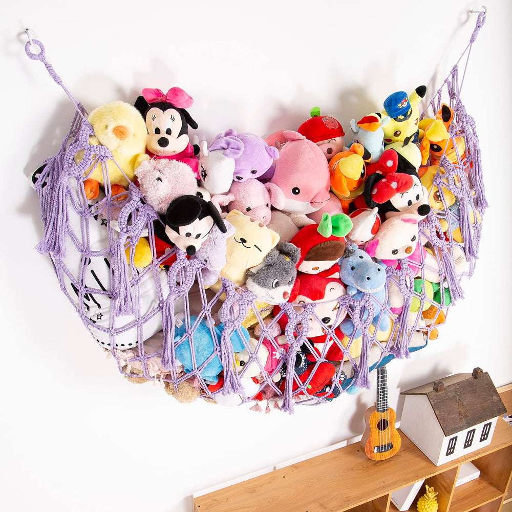 YKBU nursery wall display for stuffed animals creates organized space.
