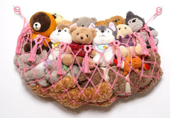 YKBU stuffed-animal net wall-macrame-setup shows a tidy toy display on a wall for space-saving storage.