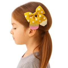 YKW Yellow Polka Dot Pencil Bow closeup—glitter band and eraser-tip details boost charm.