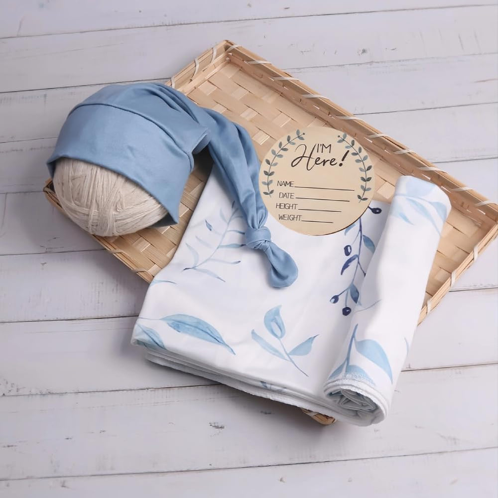 Ylsteed blue leaves swaddle blanket doubles as a nursing cover for on-the-go feeding.