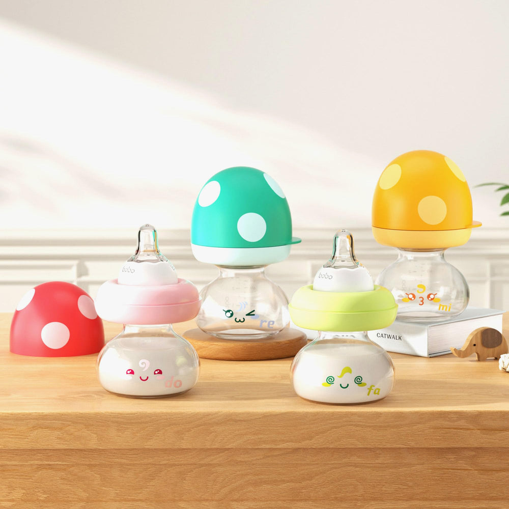 YOHKOH baby bottle made of BPA-free glass for safe feeding.