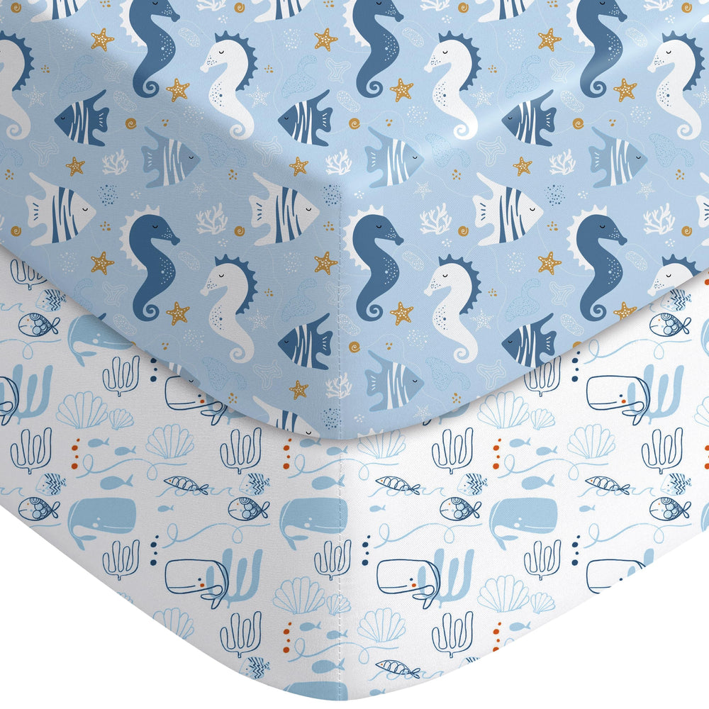 Yoofoss crib sheets in underwater world pattern provide ultra-soft comfort for baby sleep.