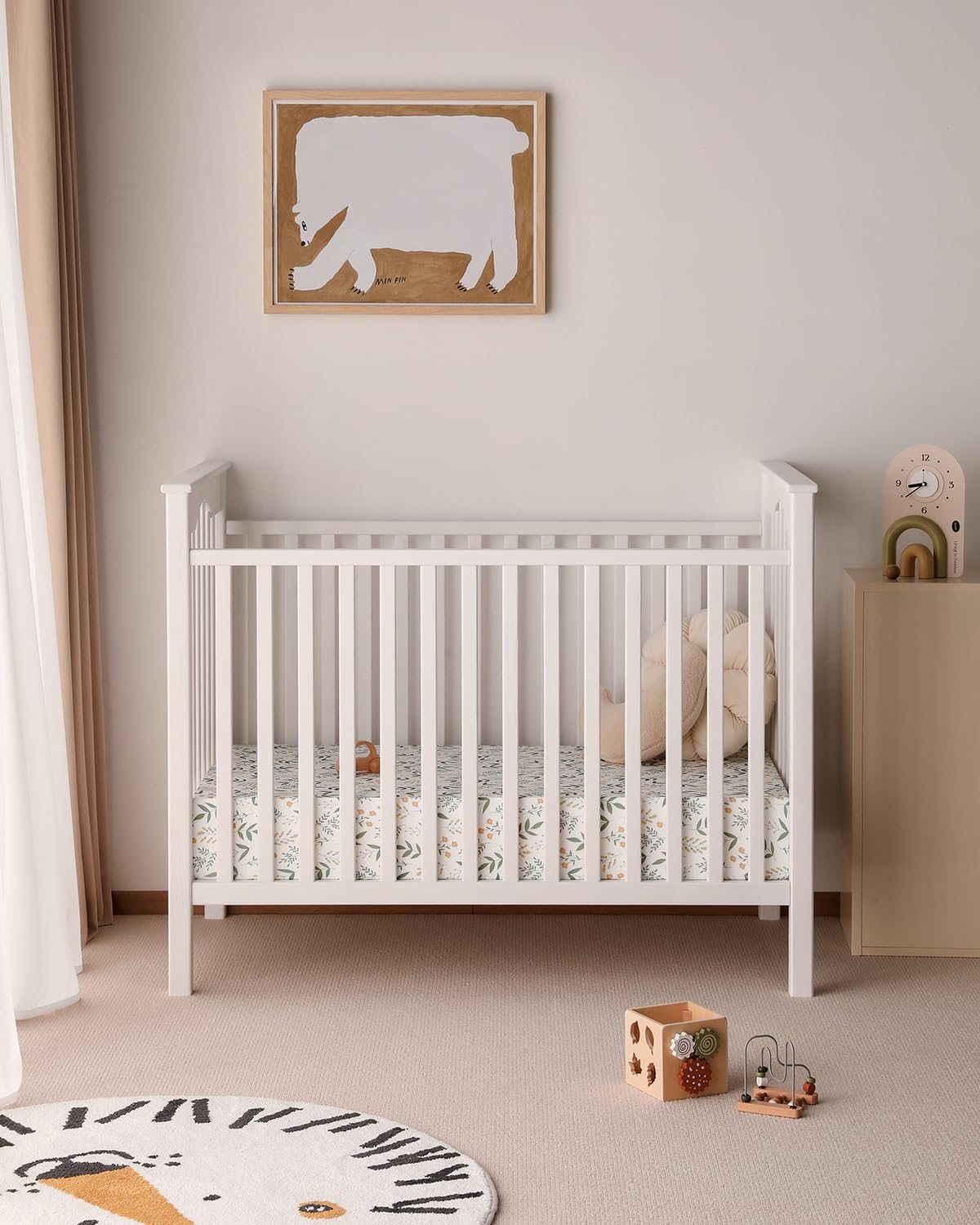 Yoofoss neutral green flower design complements any nursery style.