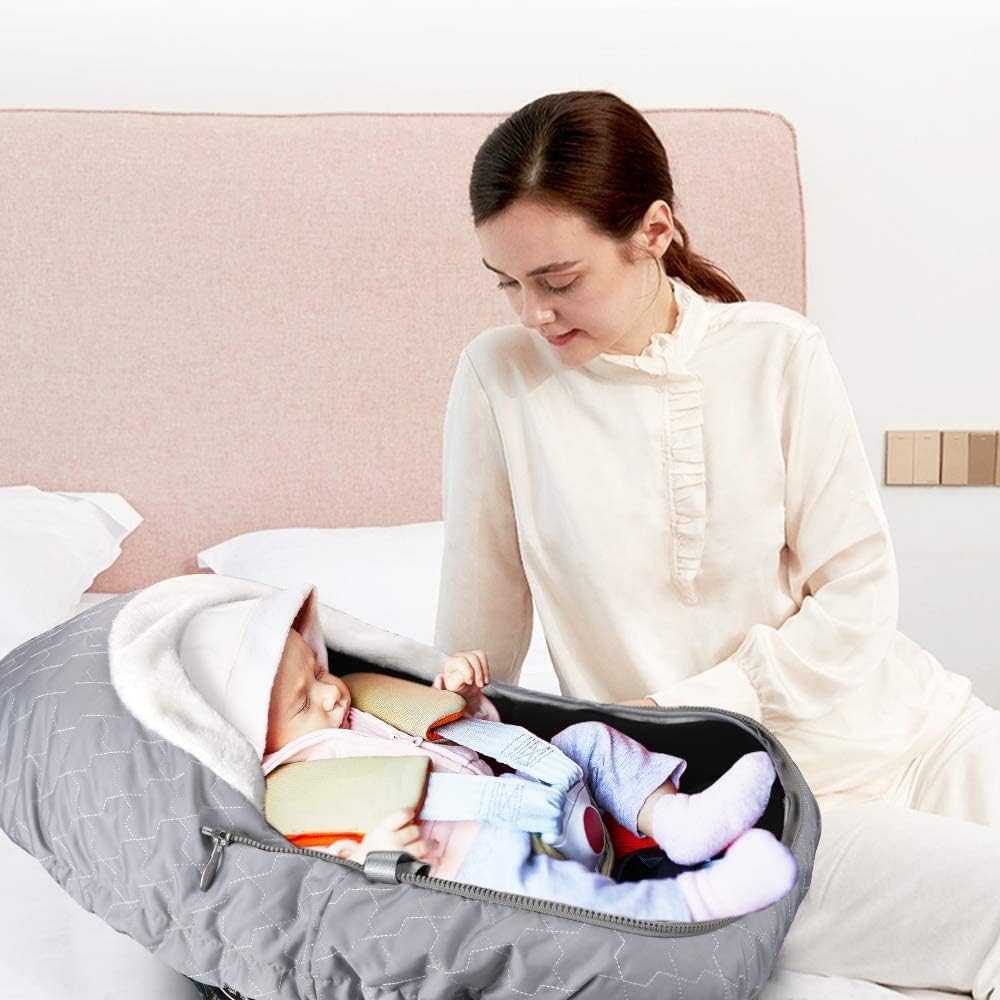 Yoofoss zip-side flap and top roll adjust temperature while keeping baby snug.