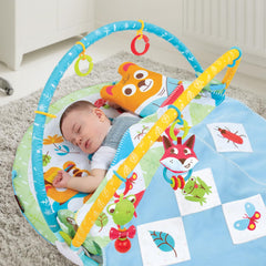 Yookidoo Baby Gym Play 'N’ Nap tummy time pillow supports early activity.