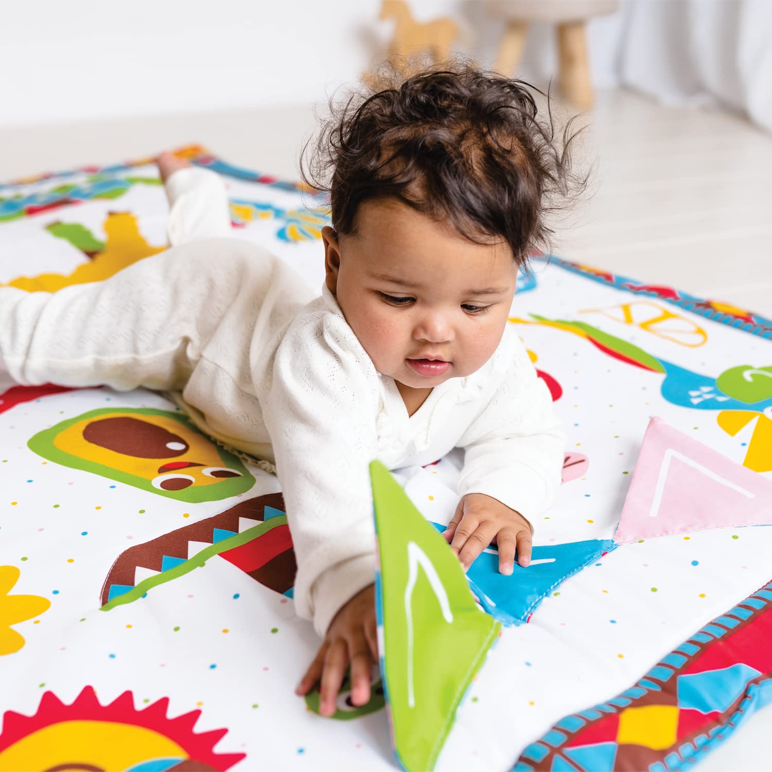 Yookidoo Fiesta Playmat self-discovery mirror invites baby to observe reflections