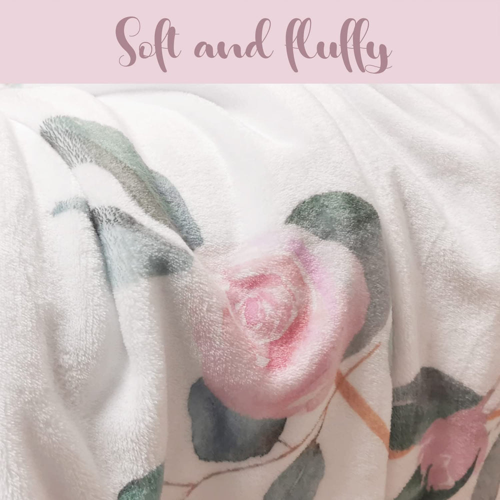 Yoothy floral milestone blanket displayed in nursery decor as keepsake