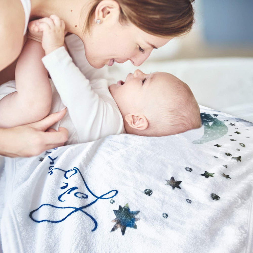Yoothy Moon blanket for swaddle use keeps baby calm during photo sessions