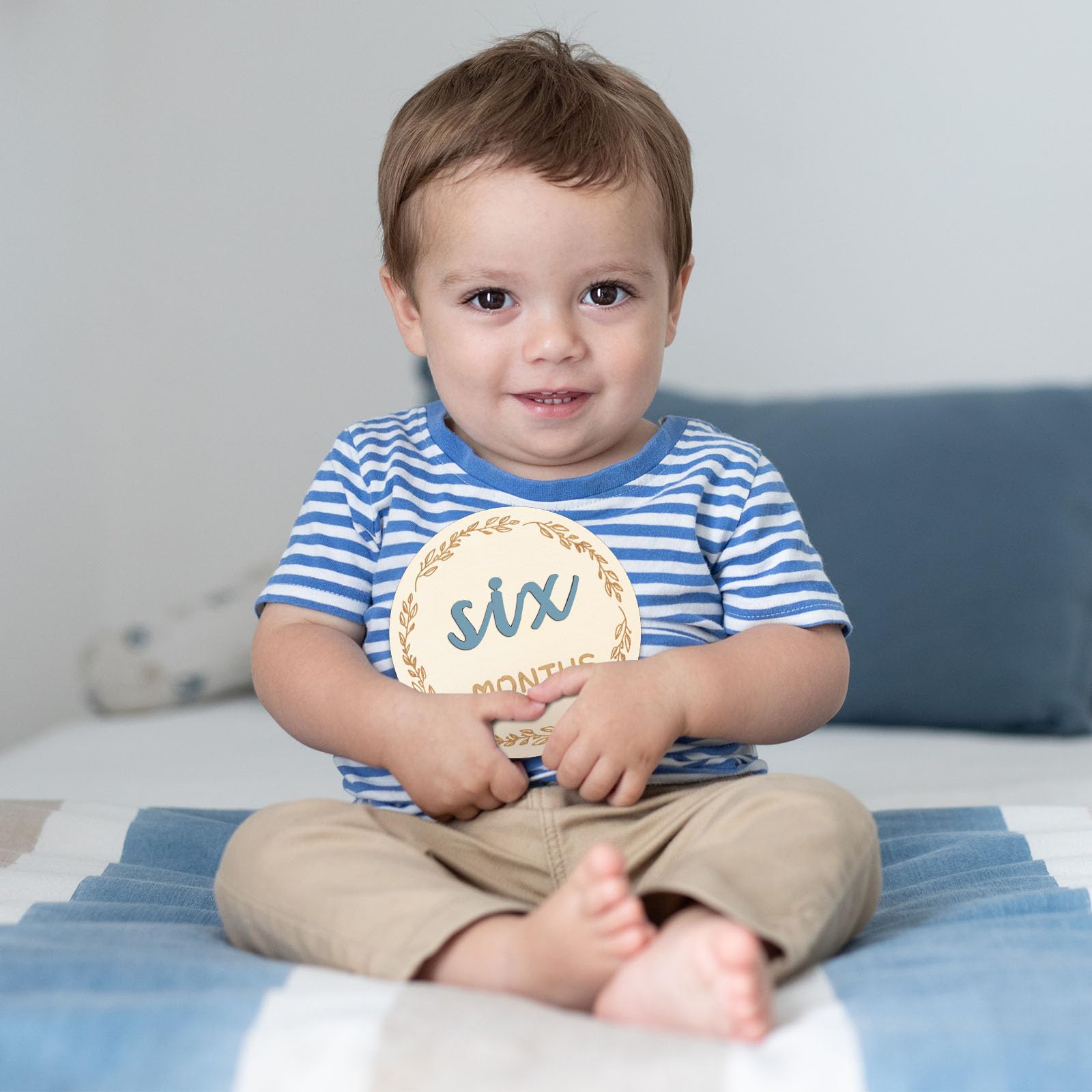 Yoshiky neutral nursery decor inspiration with stylish milestone markers