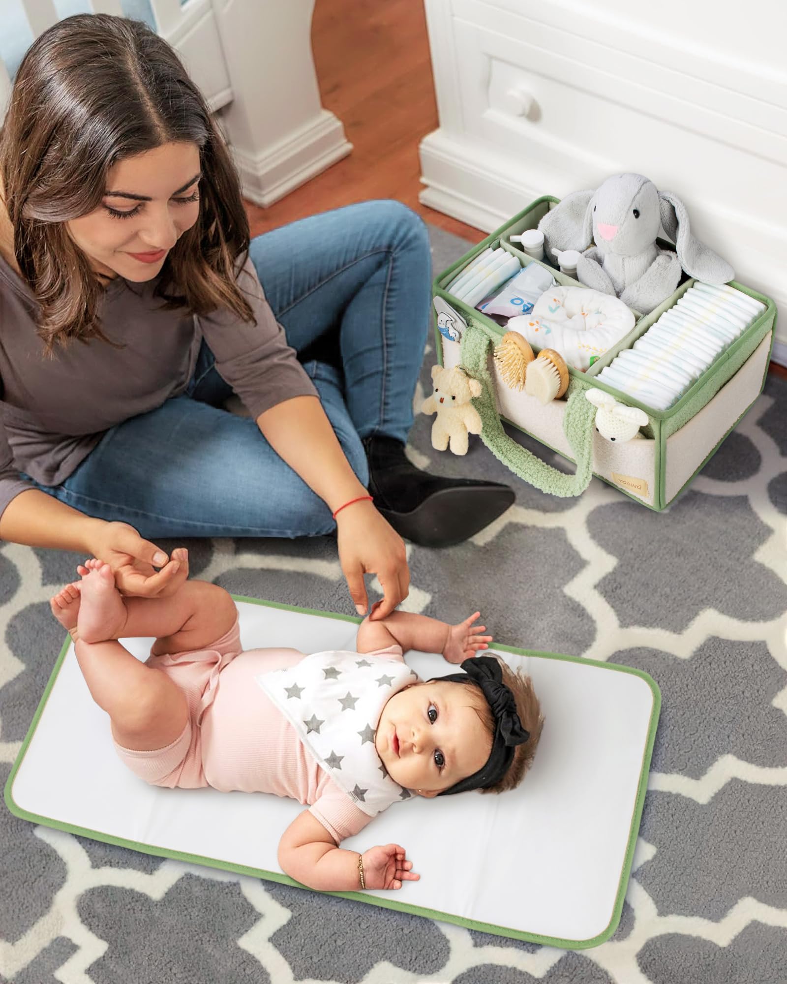YOSING distraction teddy bear included for entertaining baby during changes.
