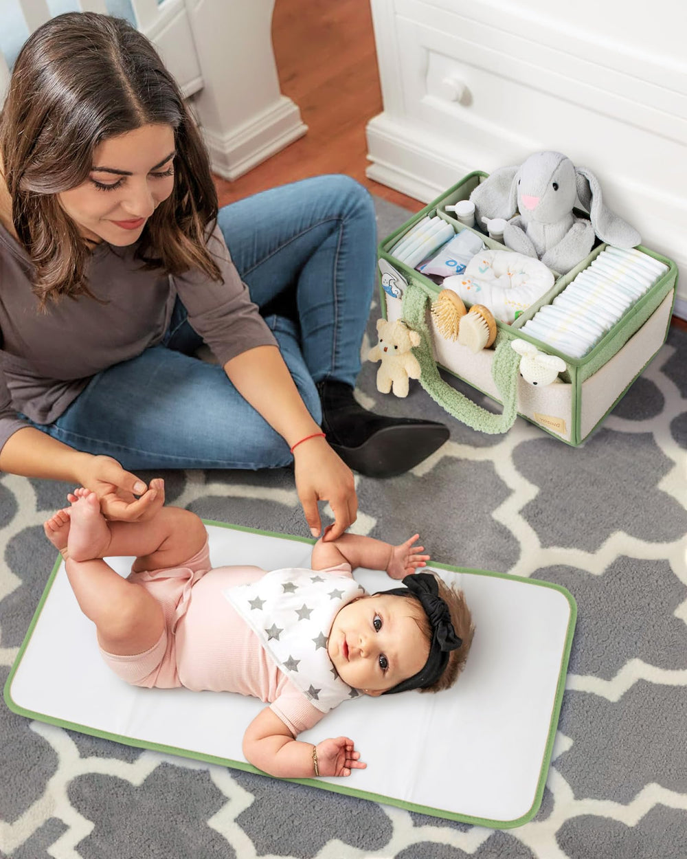 YOSING distraction teddy bear included for entertaining baby during changes.