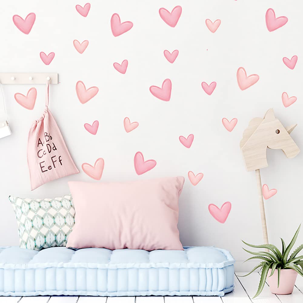 Yotdmk pink heart sticker pack on a wall adds playful charm to kids' rooms.