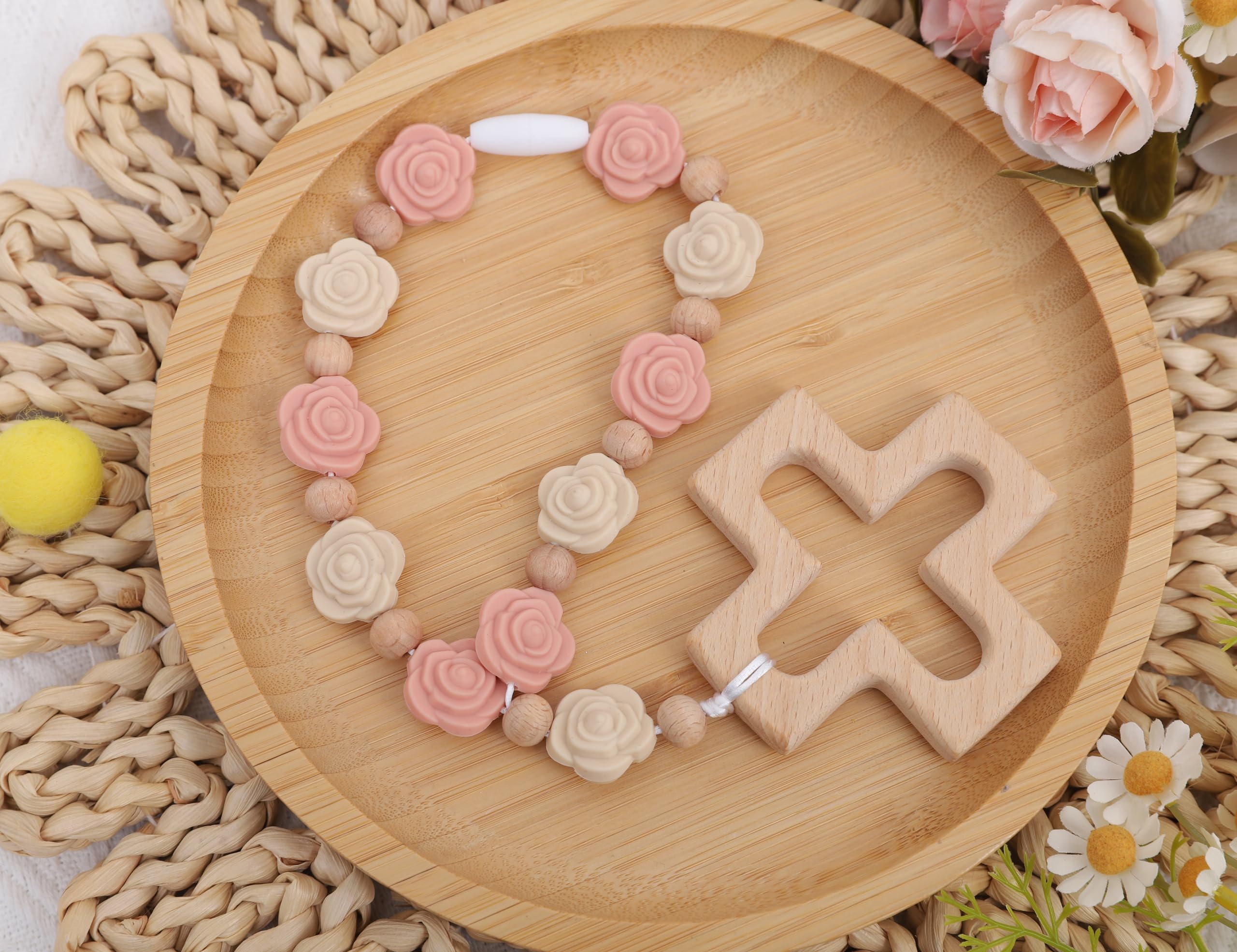 YOUAME pale pink silicone rose beads close-up emphasizes soft tactile feel.