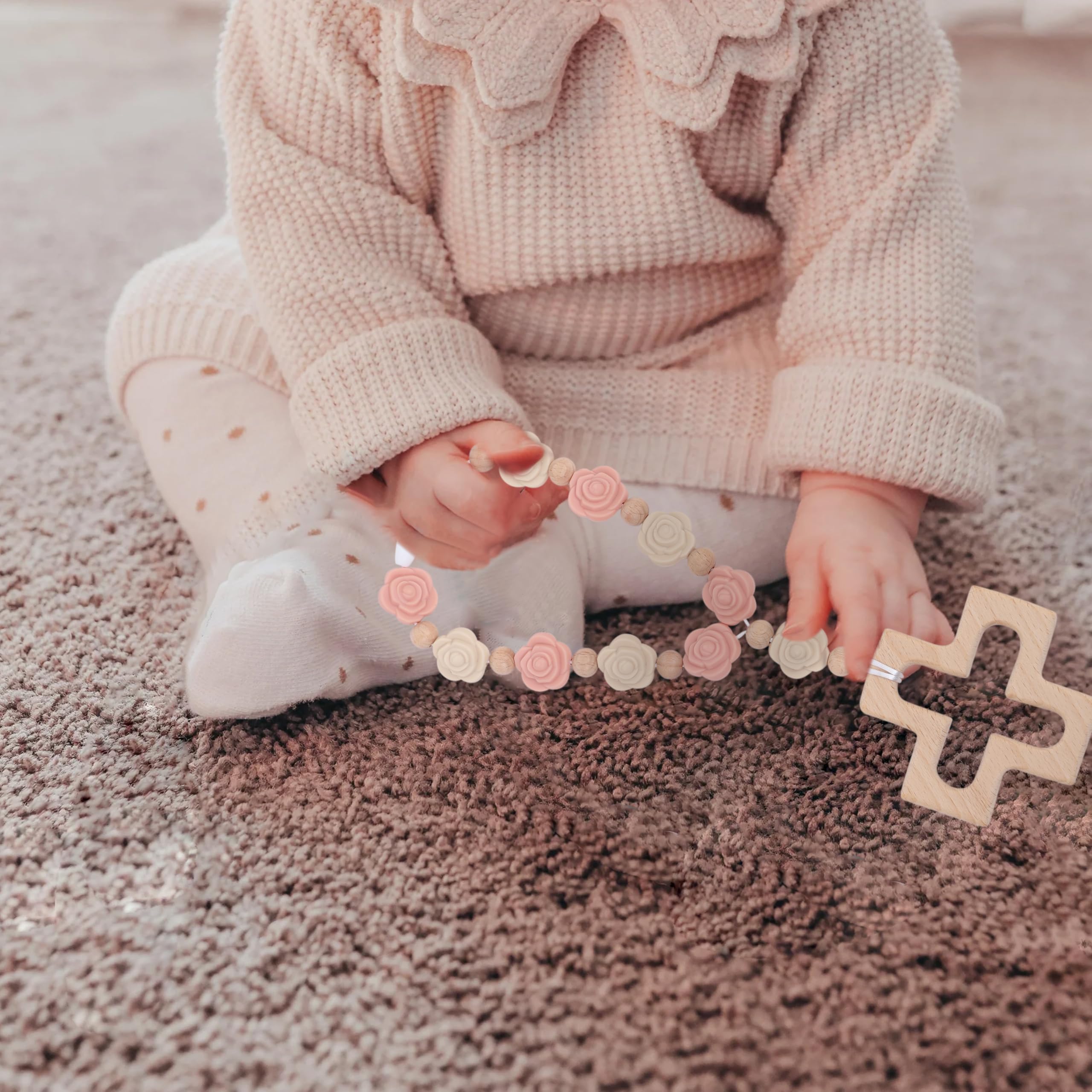 YOUAME silicone beads texture close-up shows safe, soft material for little fingers.