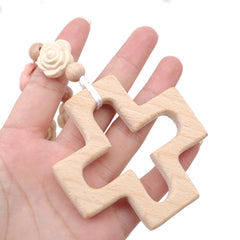 YOUAME wood cross detail offers sturdy centerpiece for a ceremonial keepsake.