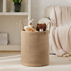 YOUDENOVA 72L tall laundry basket in living room demonstrates spacious, clutter-reducing storage.