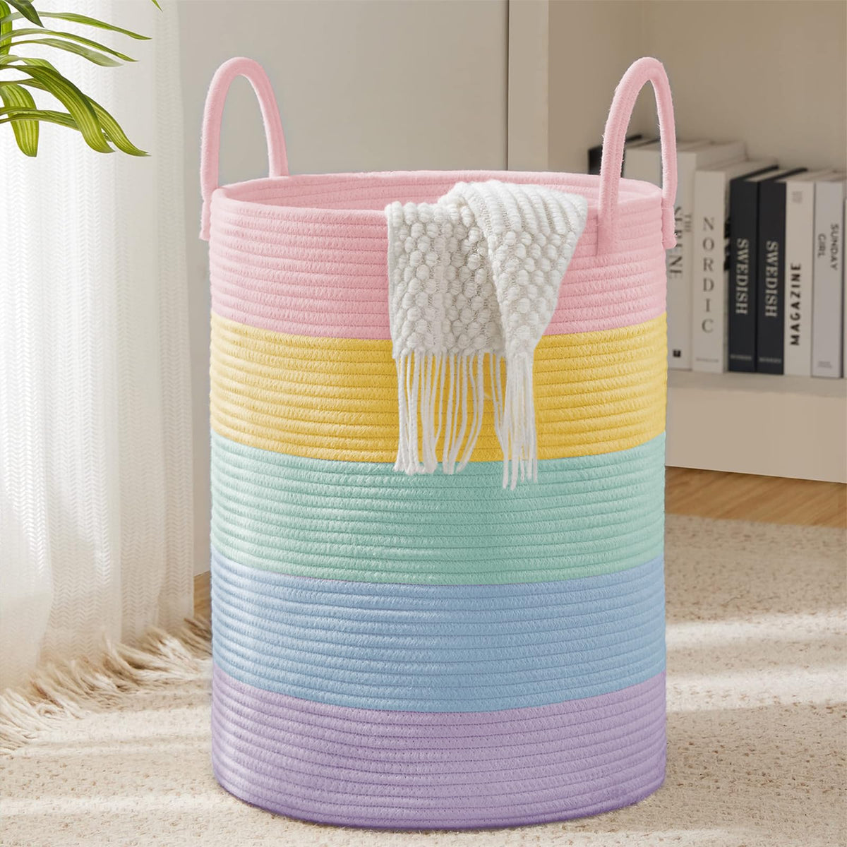 YOUDENOVA laundry hamper basket with woven design for stylish clutter control in living spaces.