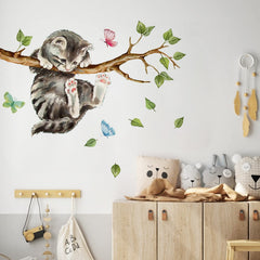 Yovkky Cat on Tree Branches wall decal adds playful charm to a kids room.