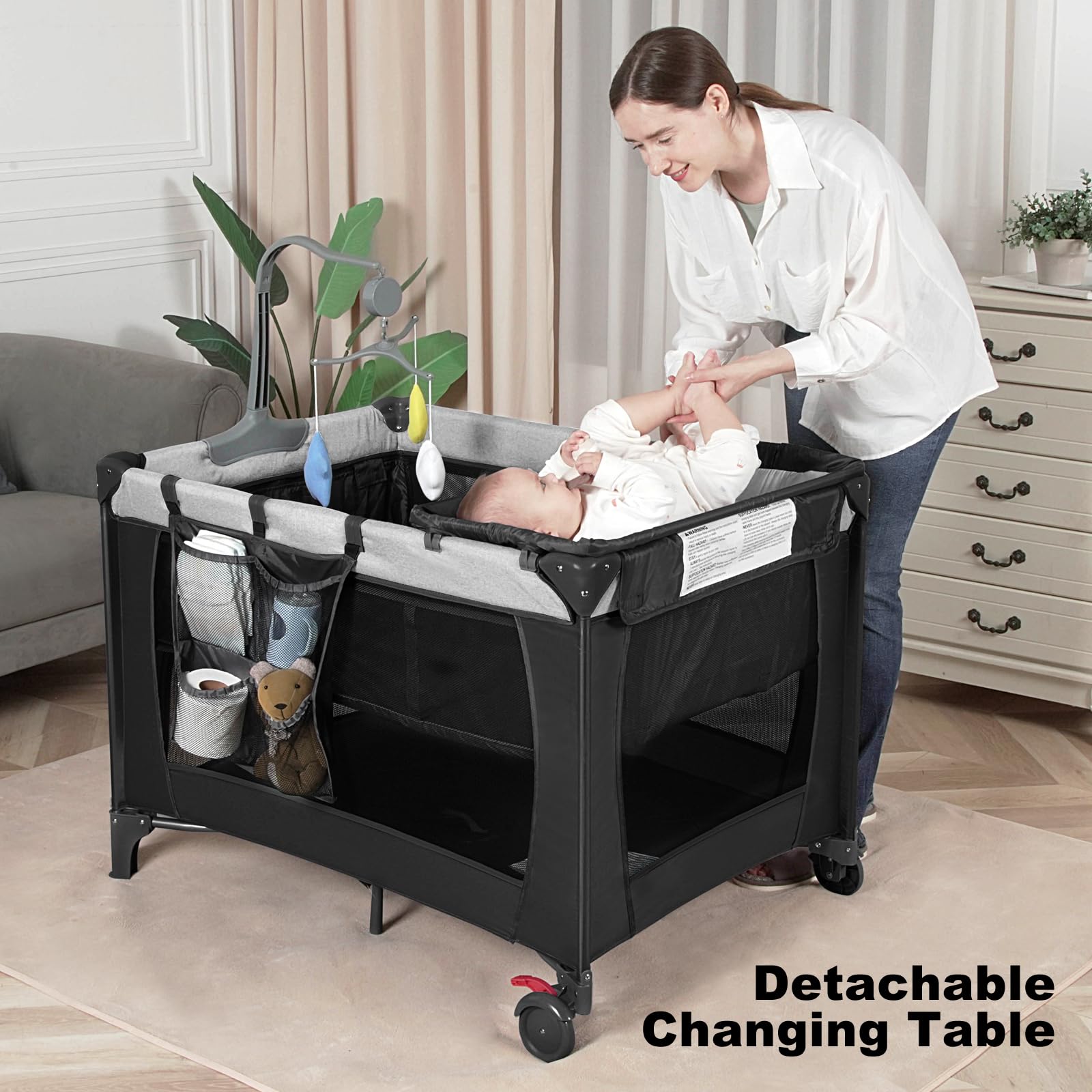 YoYiCuna Pack and Play changing table offers convenient diaper changes on the go