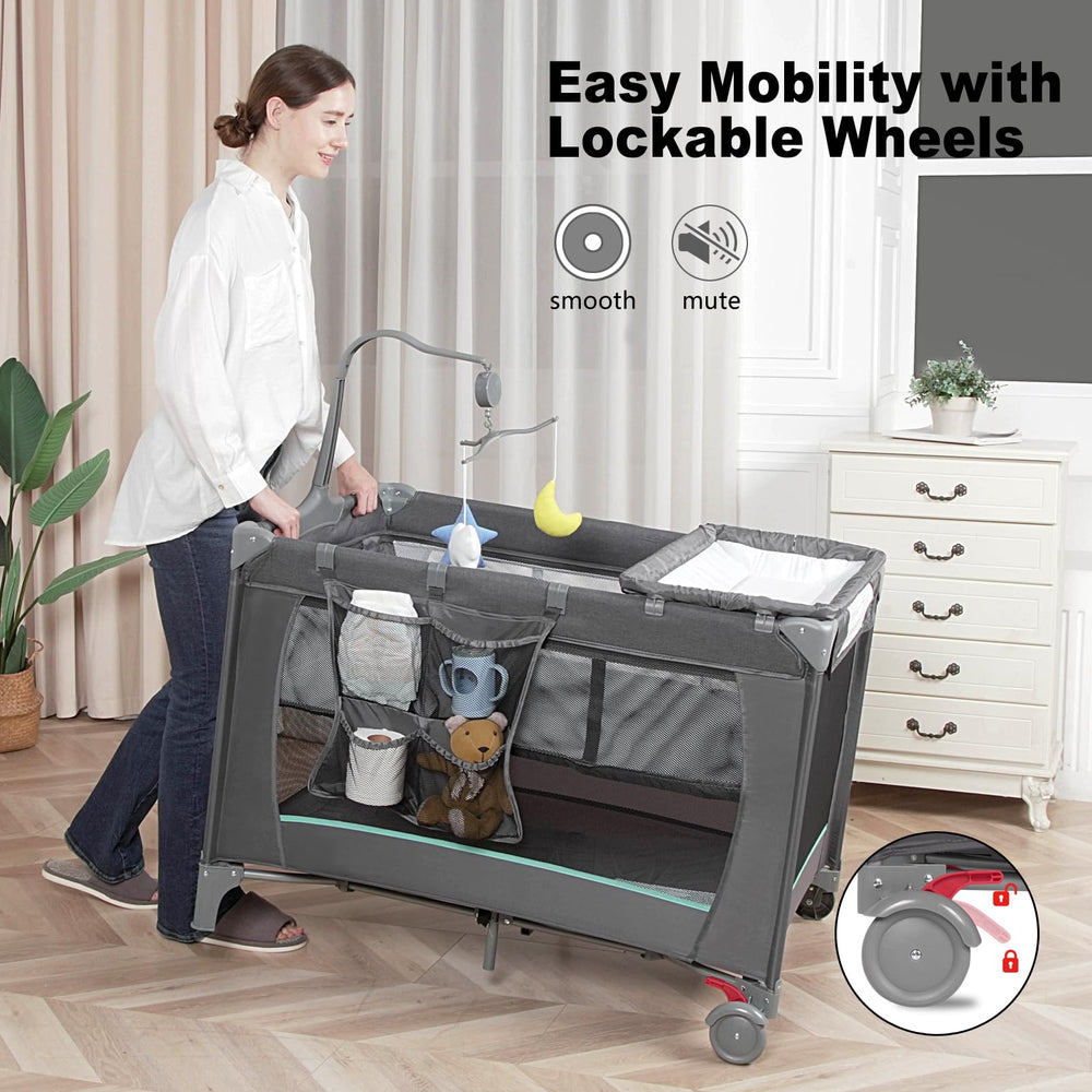 YoYiCuna Pack and Play complete bundle with mattress pad, music box, and wheels.