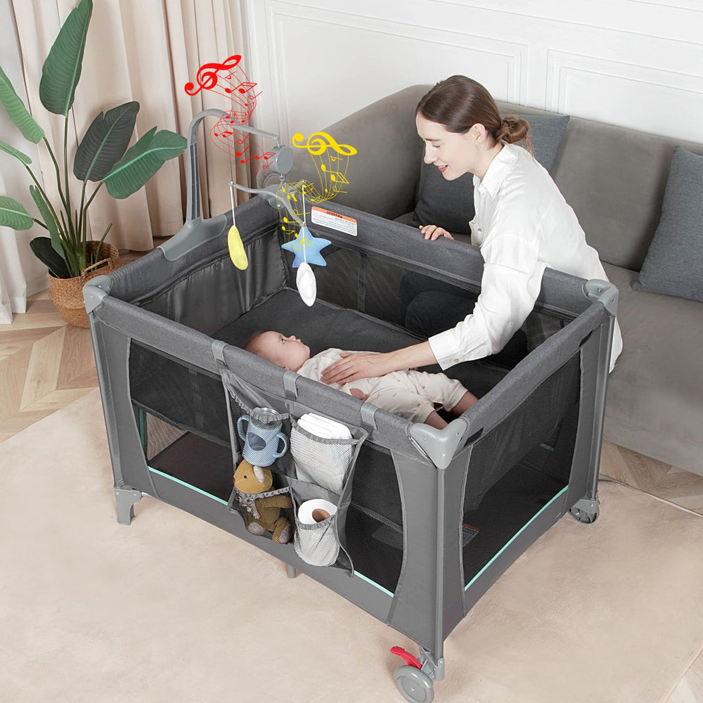 YoYiCuna Pack and Play side view highlighting the bassinet for newborns.