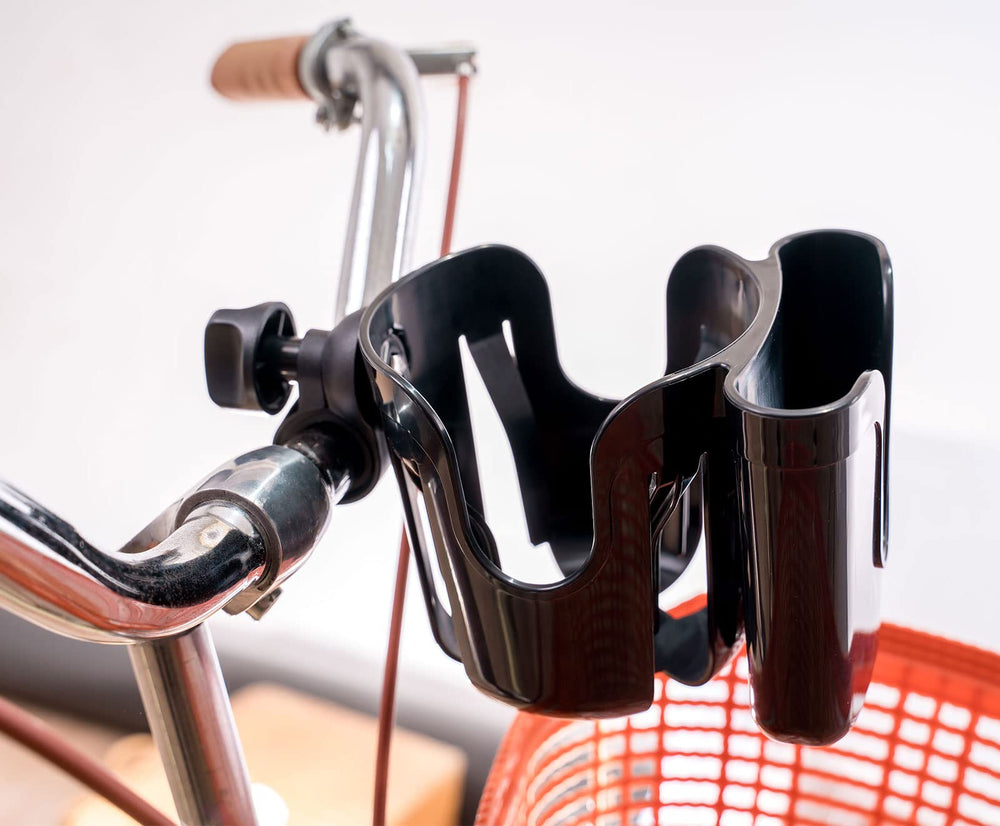 Yoyoapple adjustable cup holder securing tall bottles with flexible flaps.