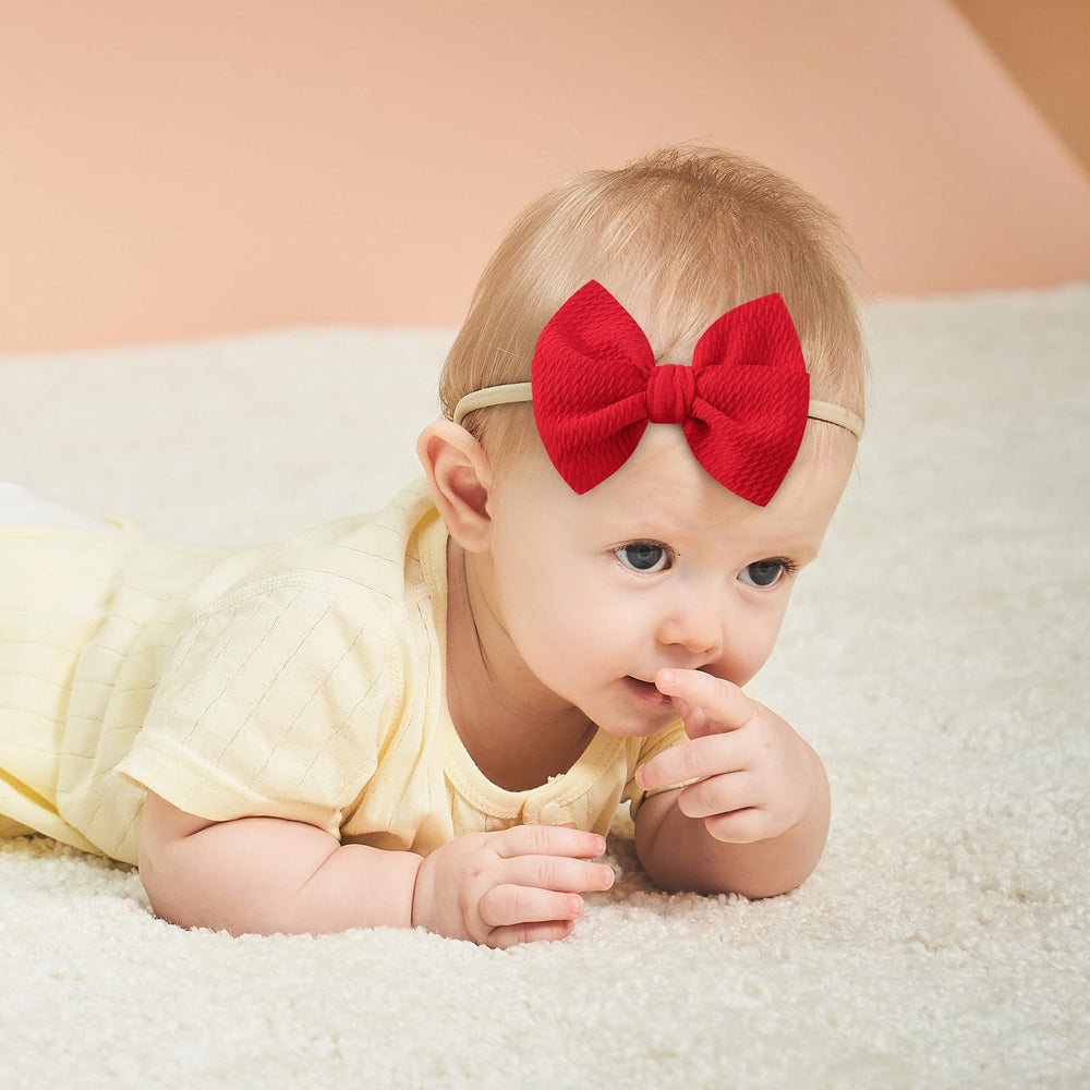yoyokid baby headbands in use during family photos, adding charming detail