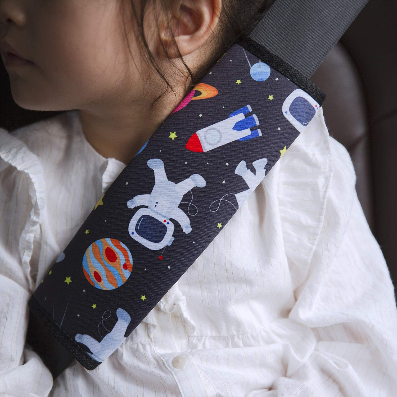 YR seat belt pad spaceman pattern with Velcro adjustment for secure belt fit.