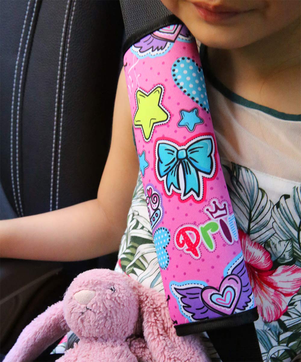 YR seat belt pad with pop pink cartoon pattern adds fun while reducing rubbing on rides.