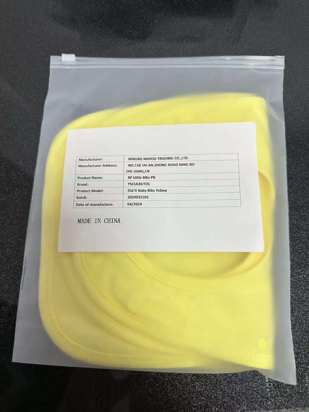 YSCULBUTOL baby twins bibs worn by infant, bright yellow and spill-friendly.