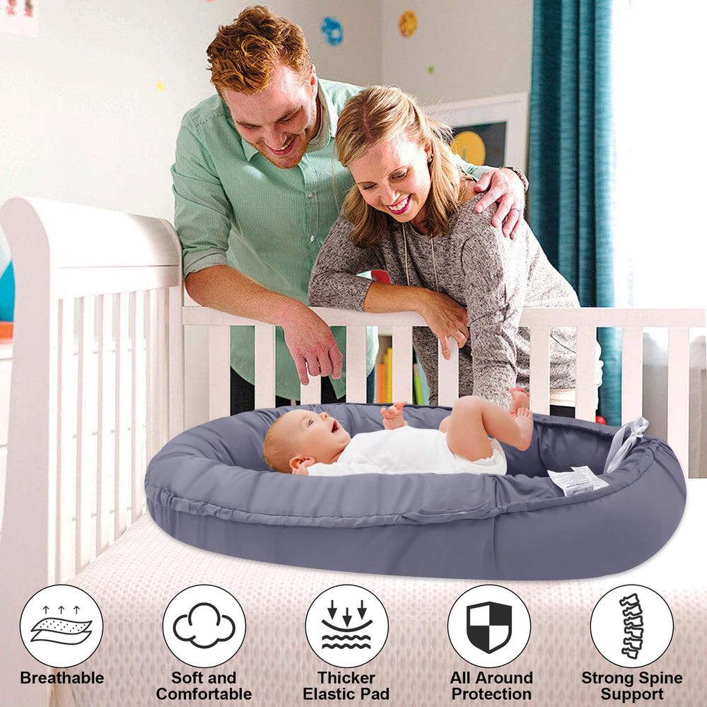 YTUGNE Baby Lounger in use with a resting newborn