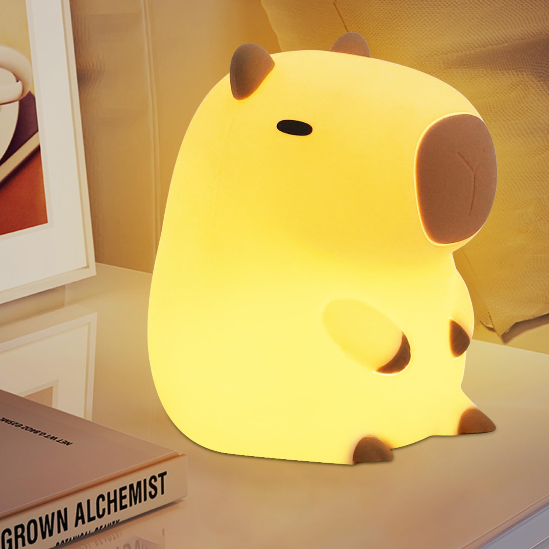 YuanDian Capybara Night Light warm glow and bottom button for adjustable brightness.