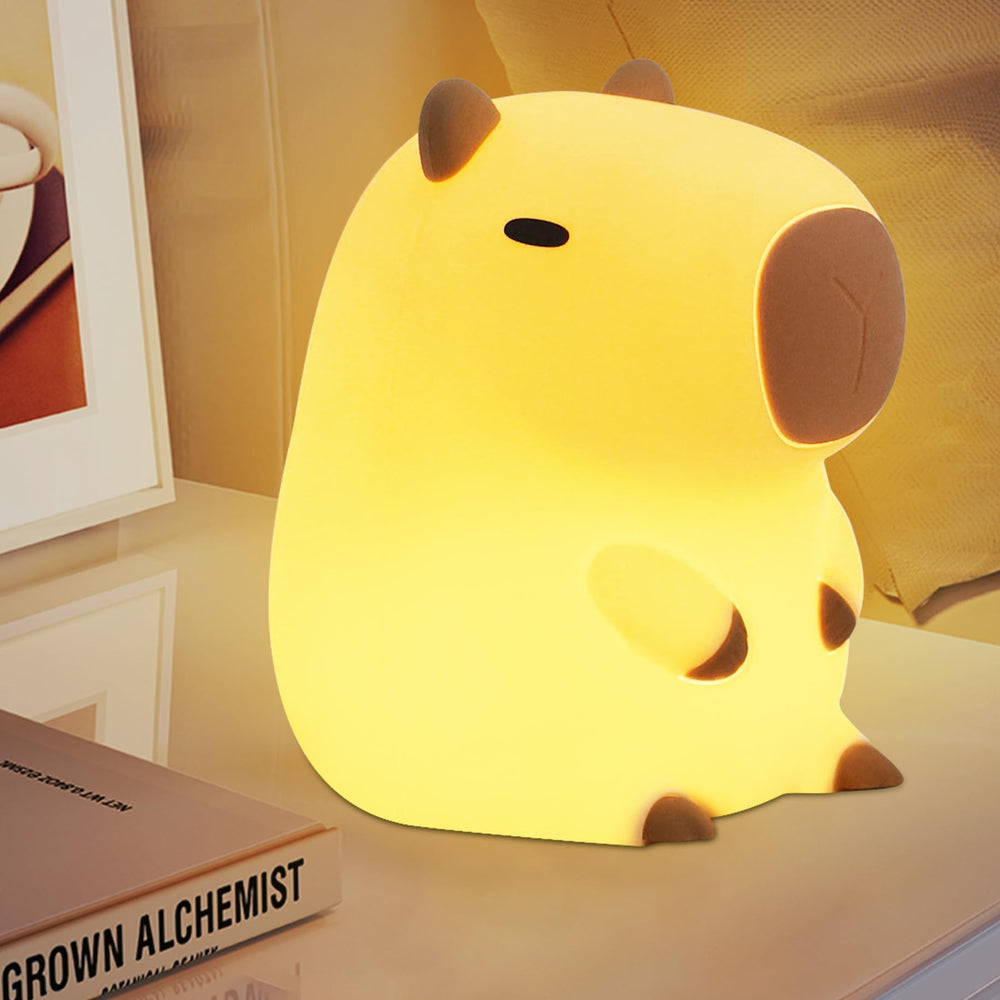 YuanDian Capybara Night Light warm glow and bottom button for adjustable brightness.
