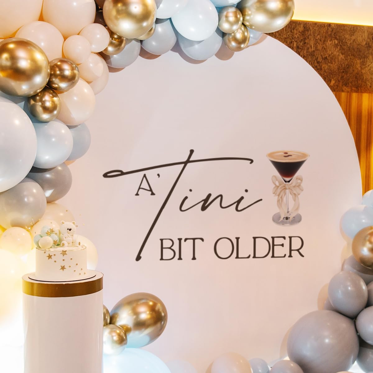 YUANY A Tini Bit Older decal enhances balloon arches for chic martini-themed parties.