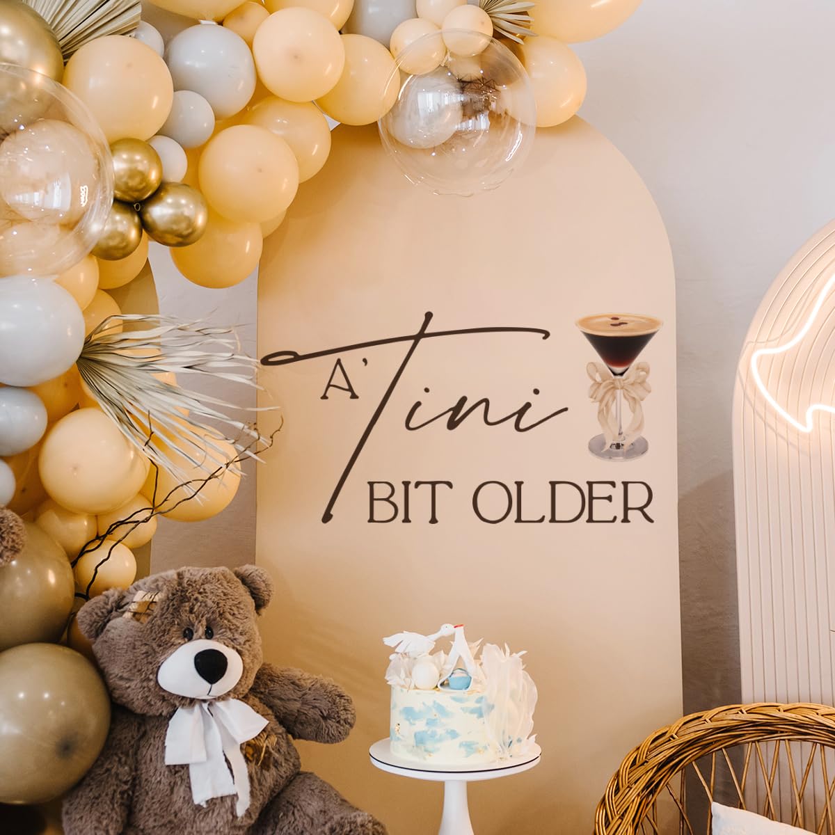 YUANY A Tini Bit Older decal martini glass graphic highlights cocktail party decor.