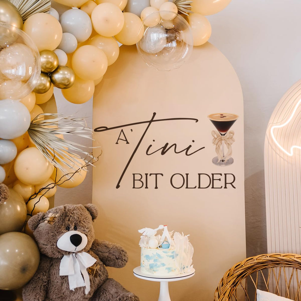 YUANY A Tini Bit Older decal martini glass graphic highlights cocktail party decor.