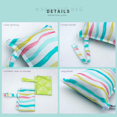 YULUONAPS wet bag with snap handle attached to stroller for hands-free outings.
