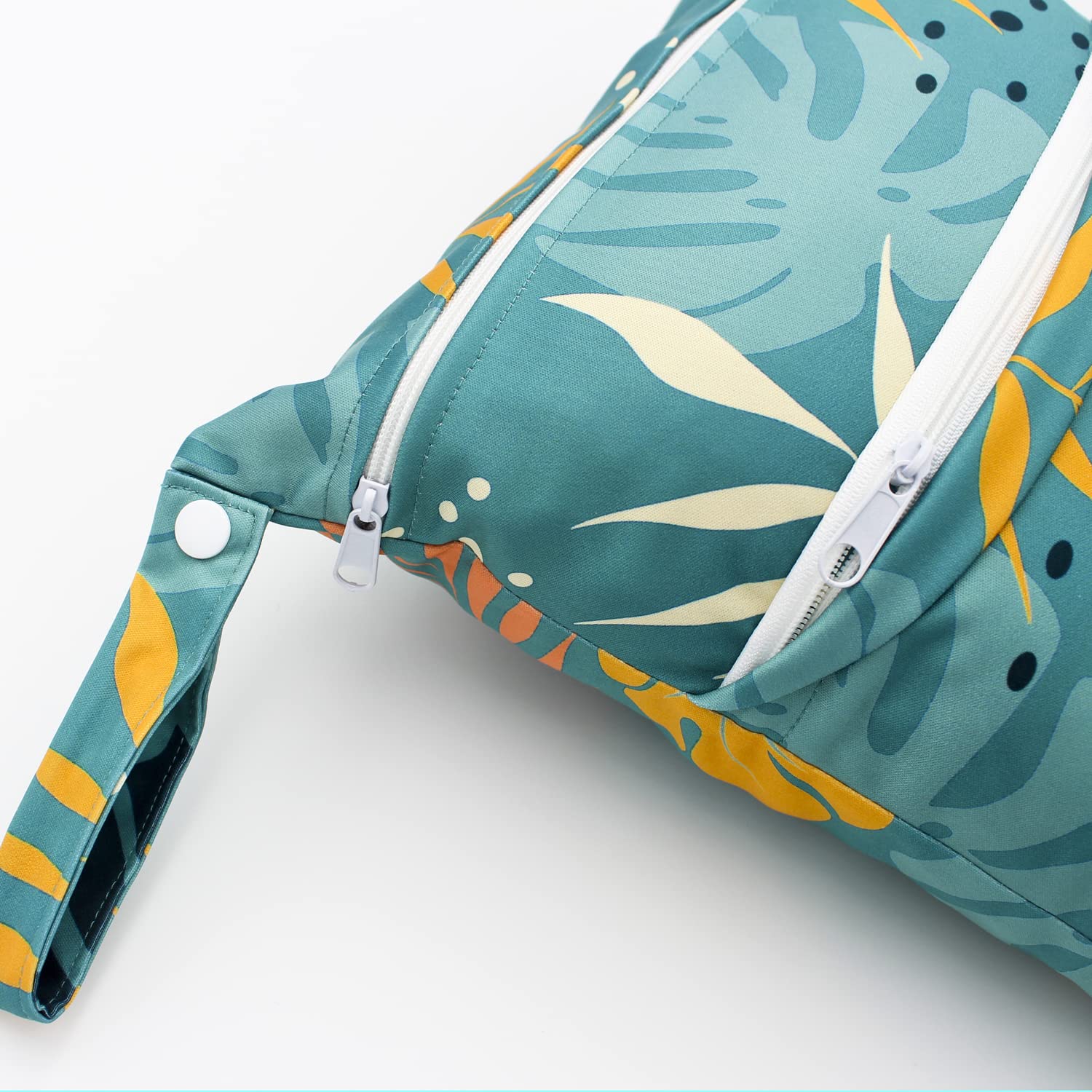 YULUONAPS wet bag green leaf close-up fabric showing waterproof coating