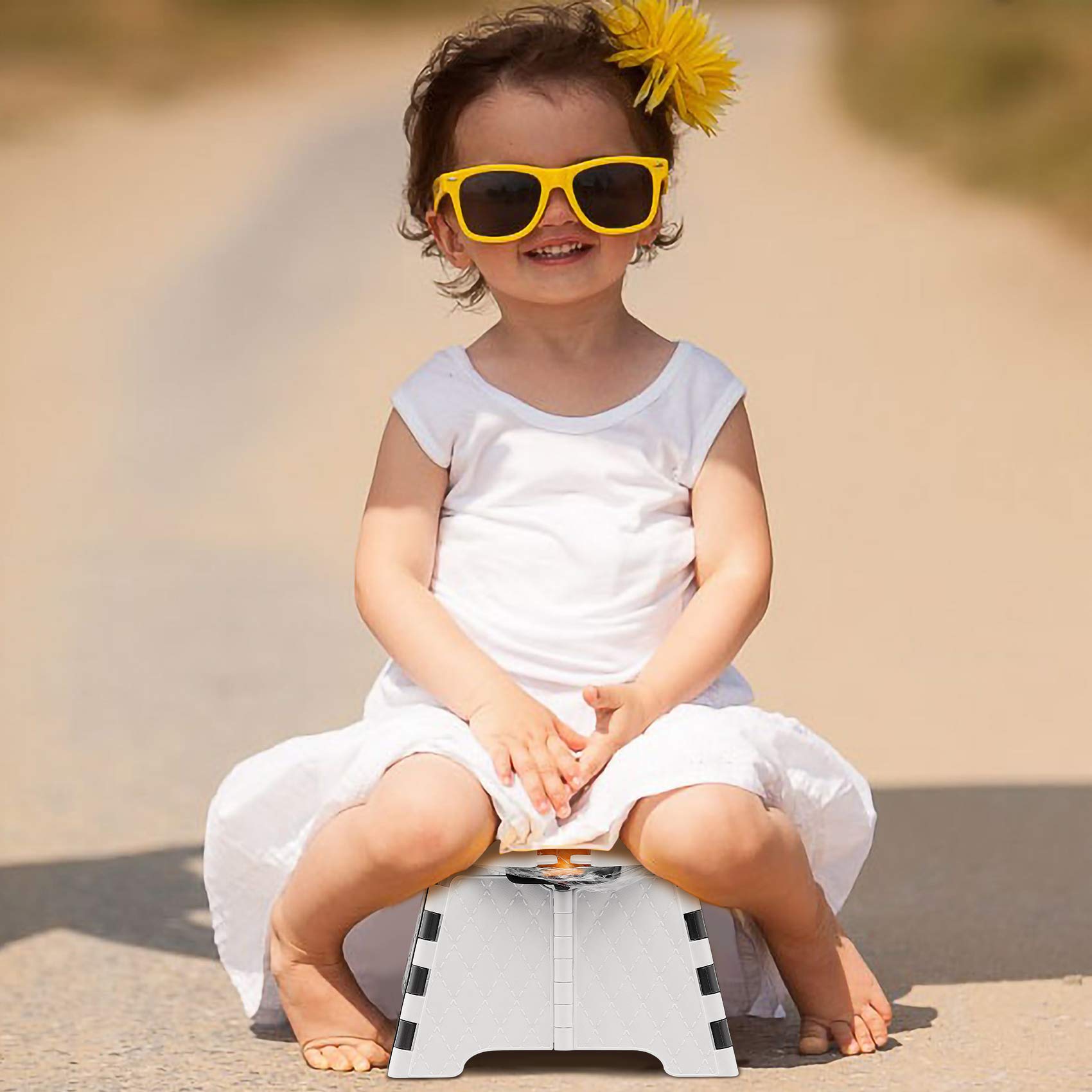 YUNHECAM portable potty seat suitable for travel, camping, and long car rides.
