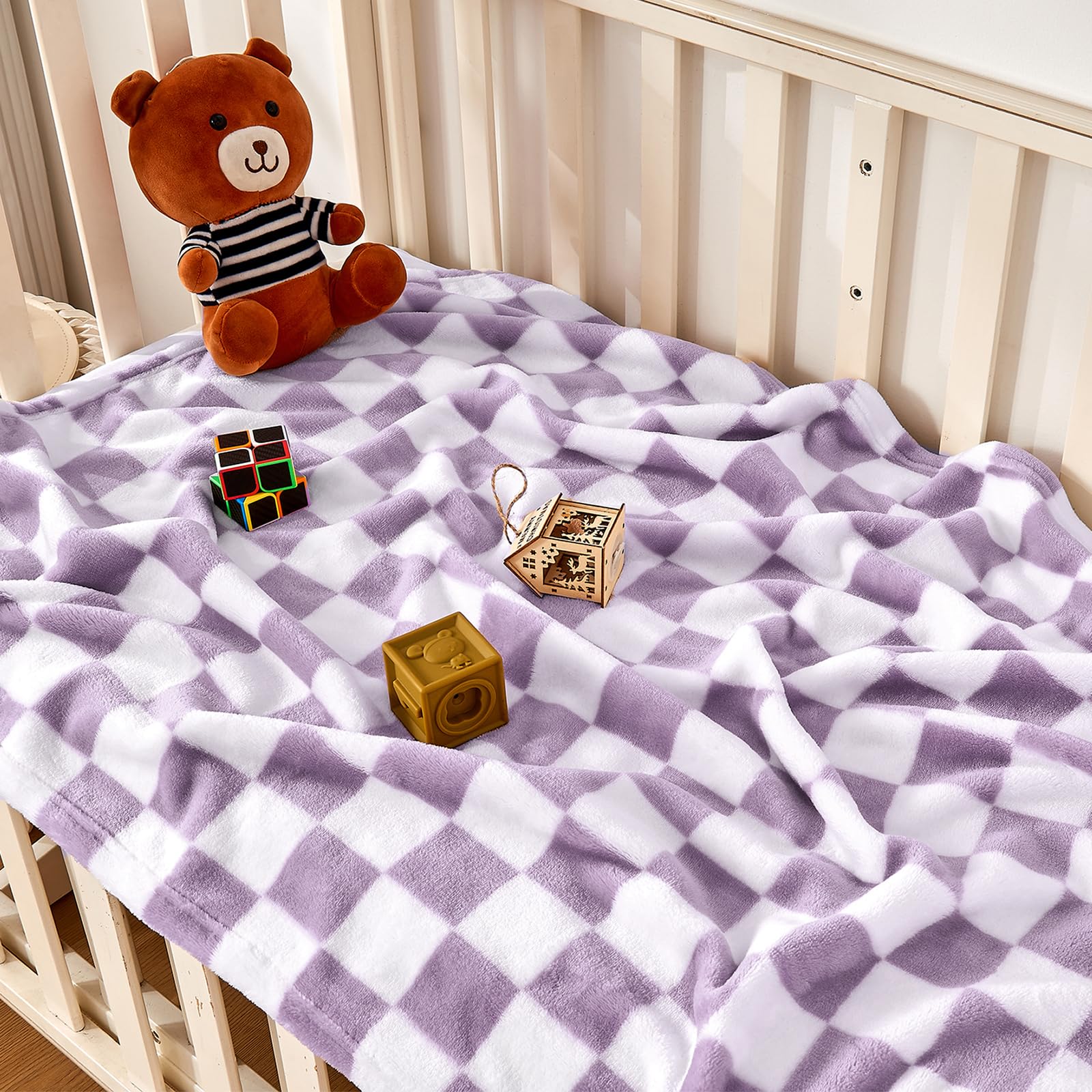 Yurhap purple ultra-soft fleece baby blanket ready for nap time.