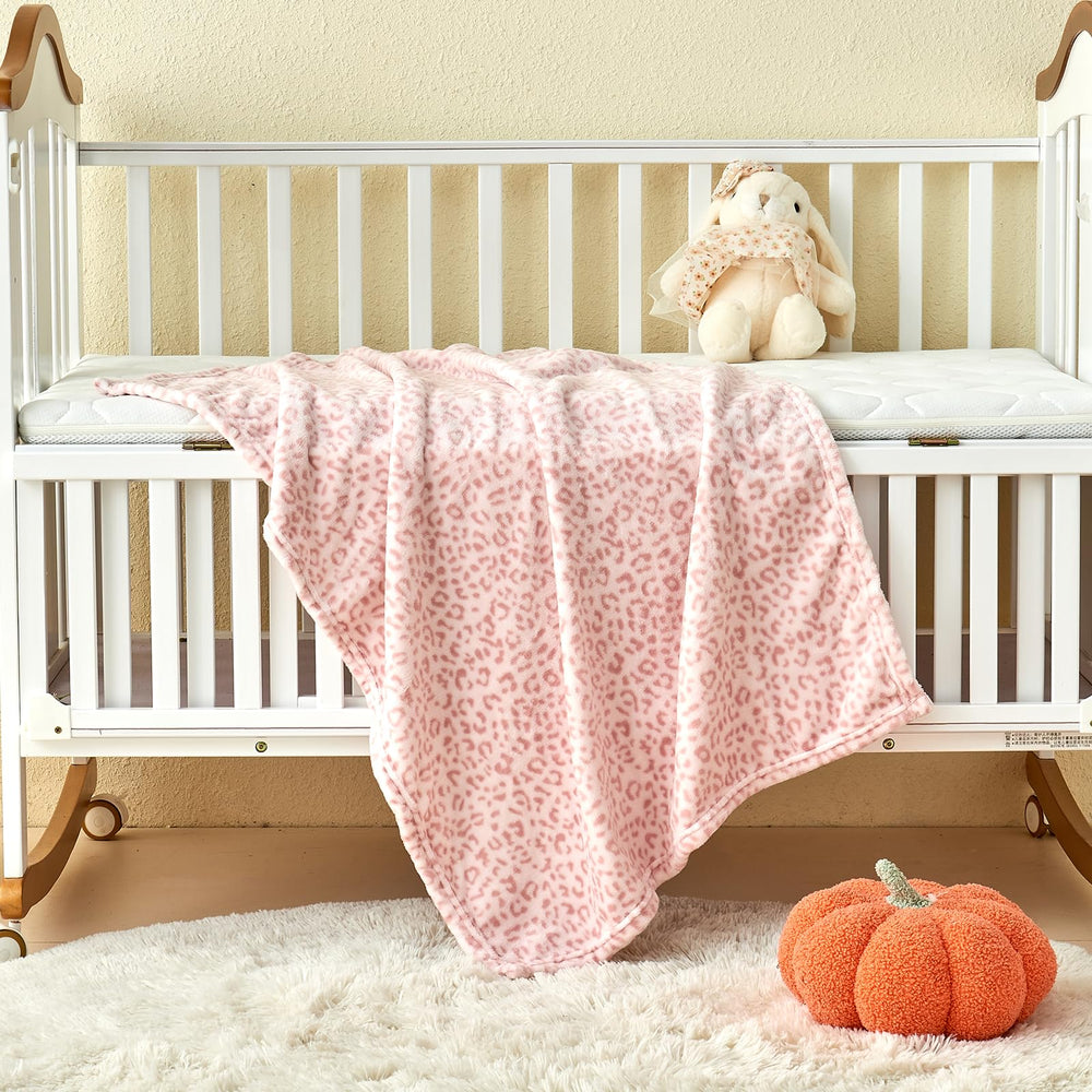 Yurhap leopard print baby blanket in nursery setup with soft texture