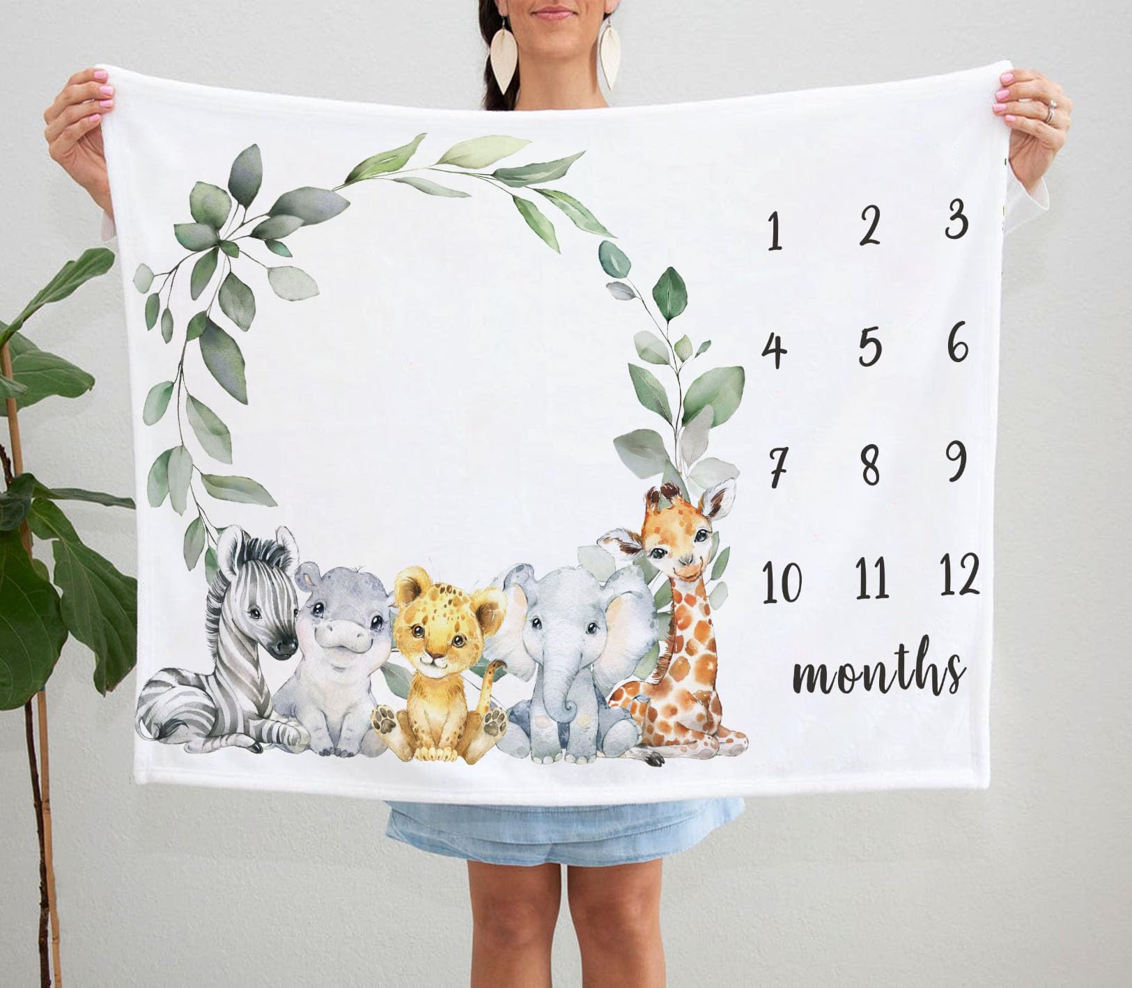 Yuzioey safari milestone blanket ready to use as a background for newborn photo sessions.