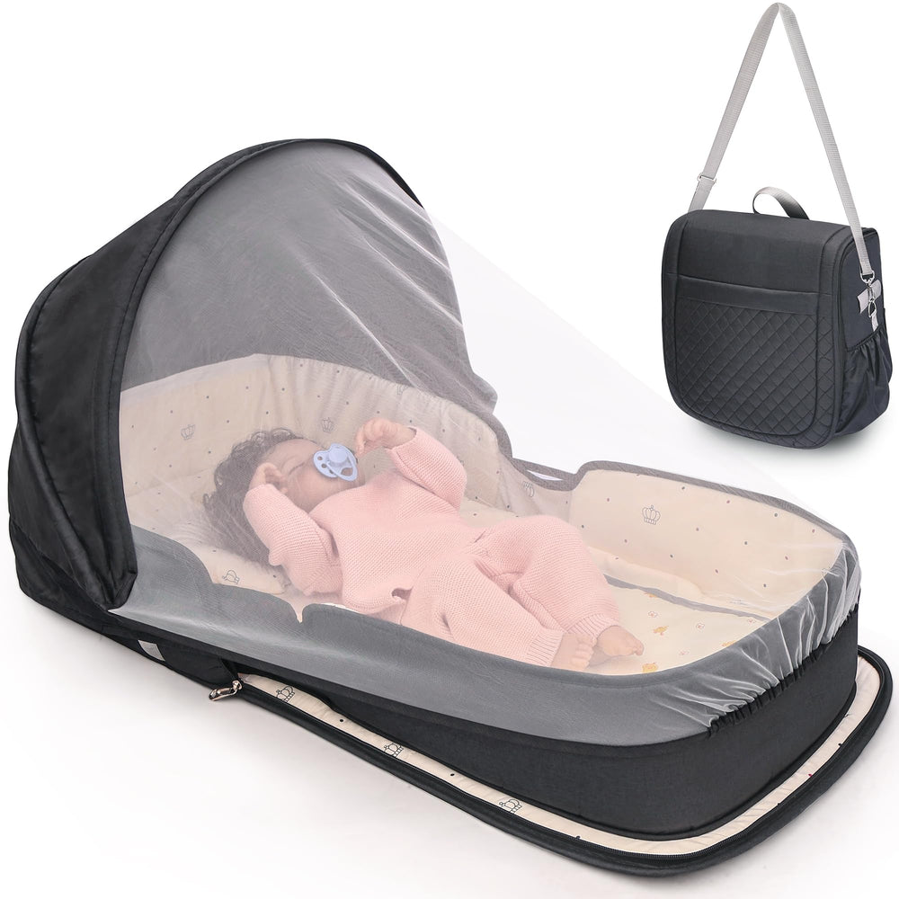 YVMVDV travel bassinet front view with compact fold and breathable fabric.