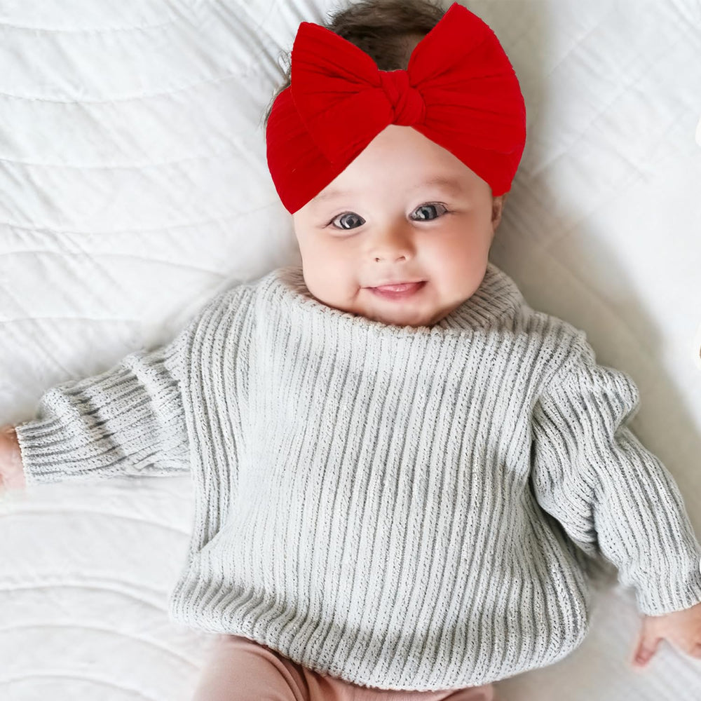 YWAOAIJD baby wearing bows headband demonstrates everyday charm and comfort