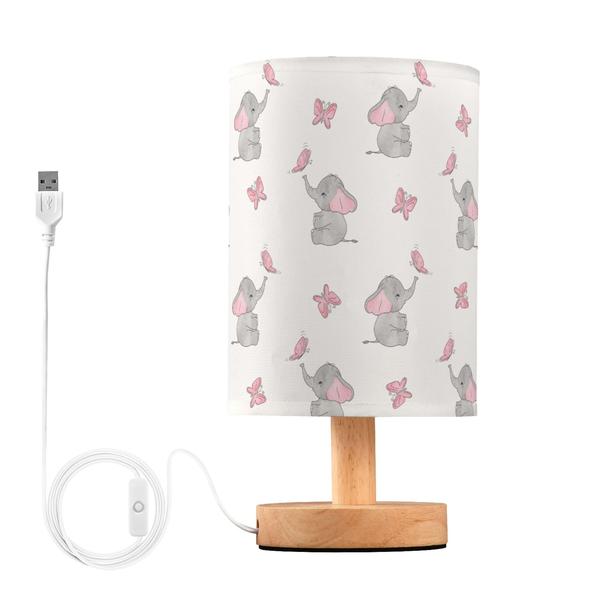 YYZZH elephant lamp with wood base provides stable support for a child's desk.