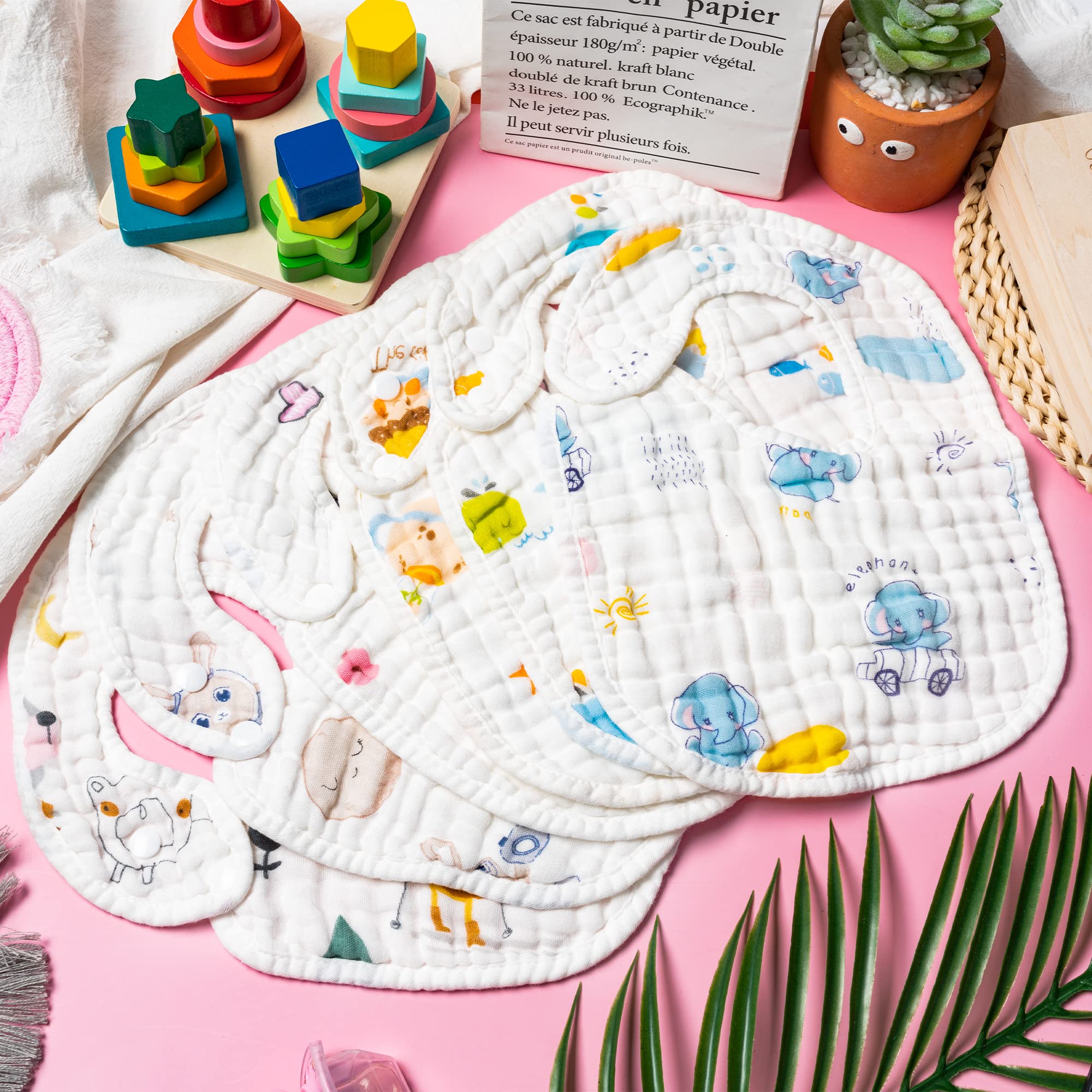 Zainpe baby bib planet pattern offers playful style and moisture absorption during feeding.
