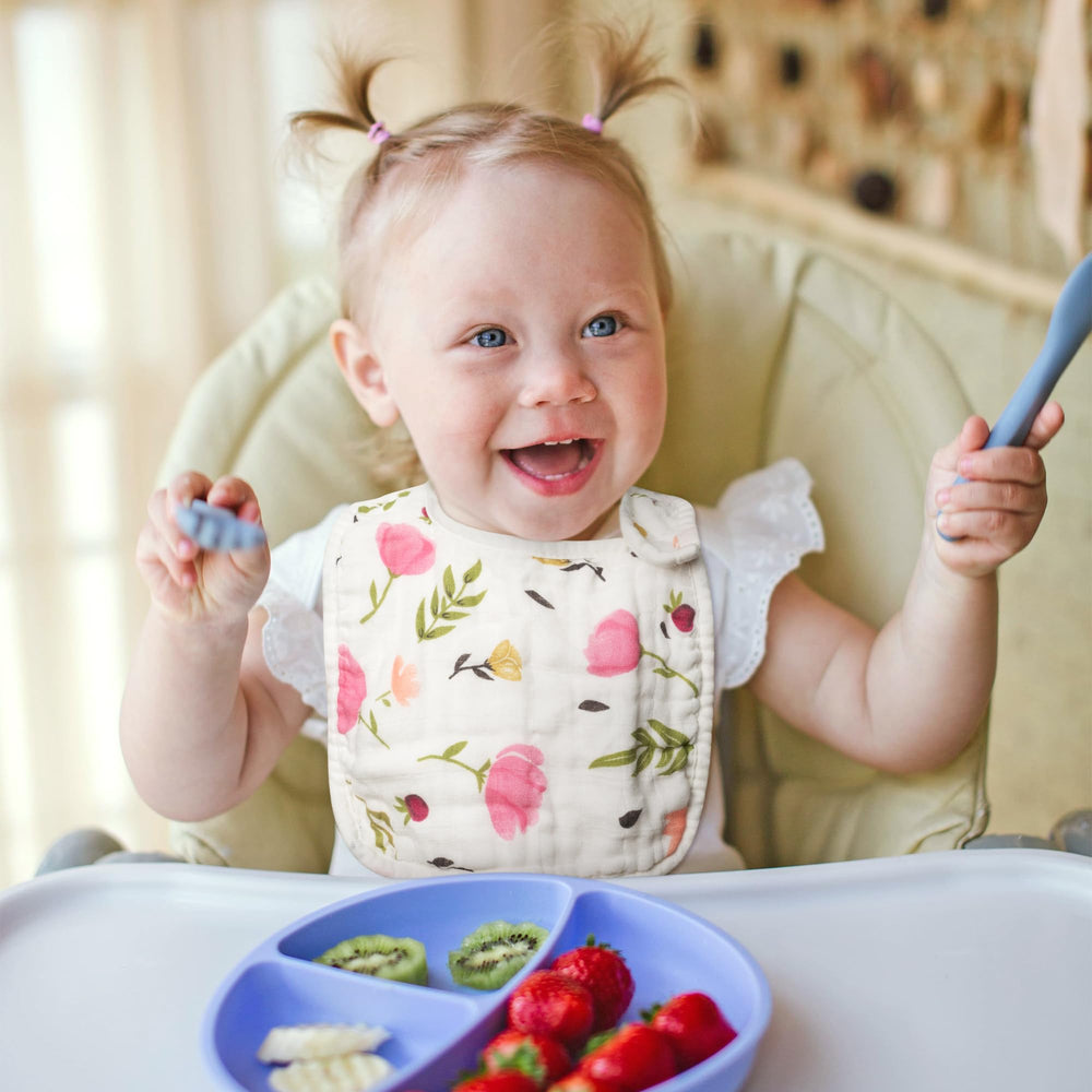Zainpe butterflies and flowers pattern bibs add cheerful style.