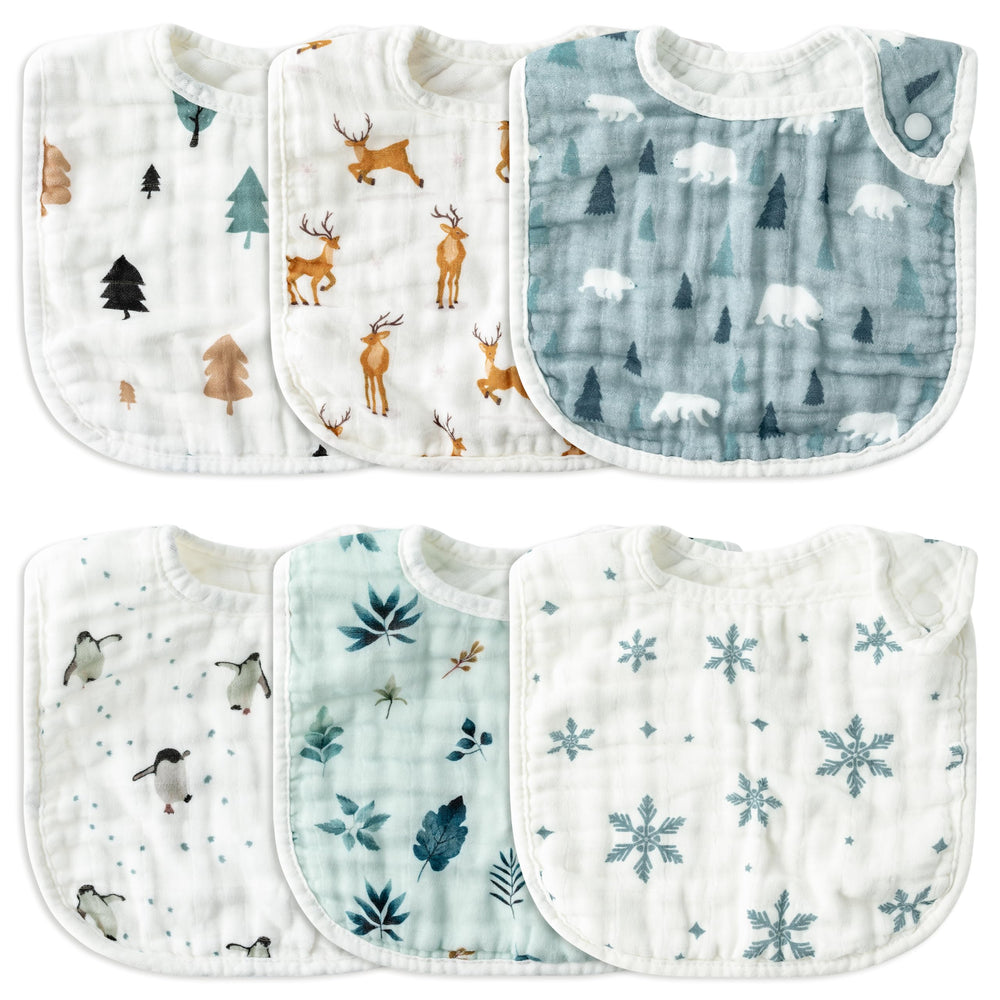 Zainpe snowflake penguin pattern bib keeps baby dry during feeding and teething.