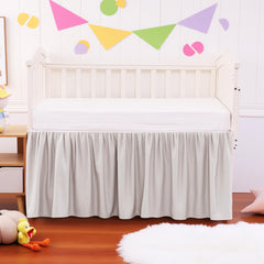 Zaizaihome crib skirt installation closeup shows effortless one-piece setup saving time.