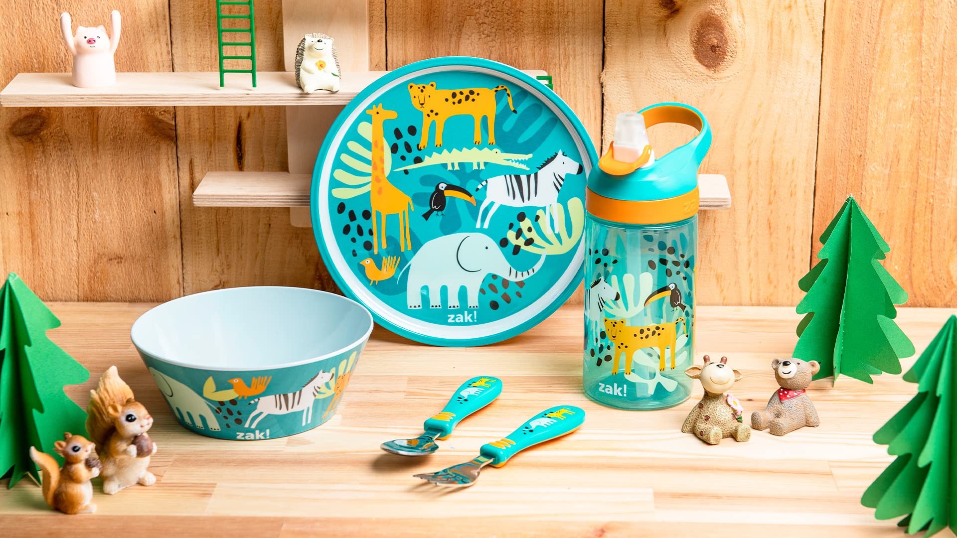 Zak Designs Safari table setup showing a colorful complete dinnerware set.
